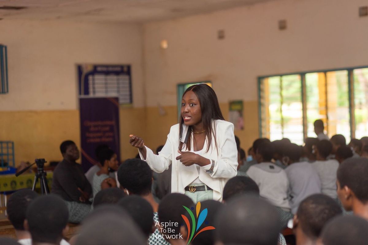A team member presenting to students at Accra Girls'