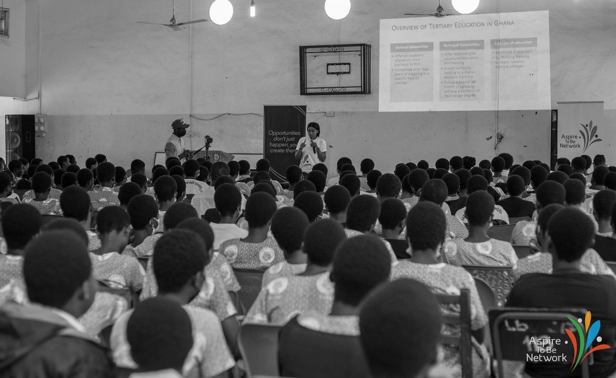 Aspire To Be Network addressing a full hall of senior high students