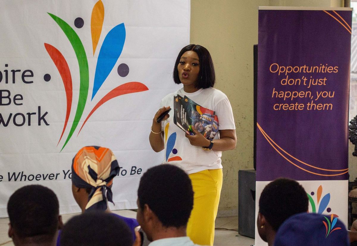 Founder presenting the Career Development Guide at the Tesano engagement